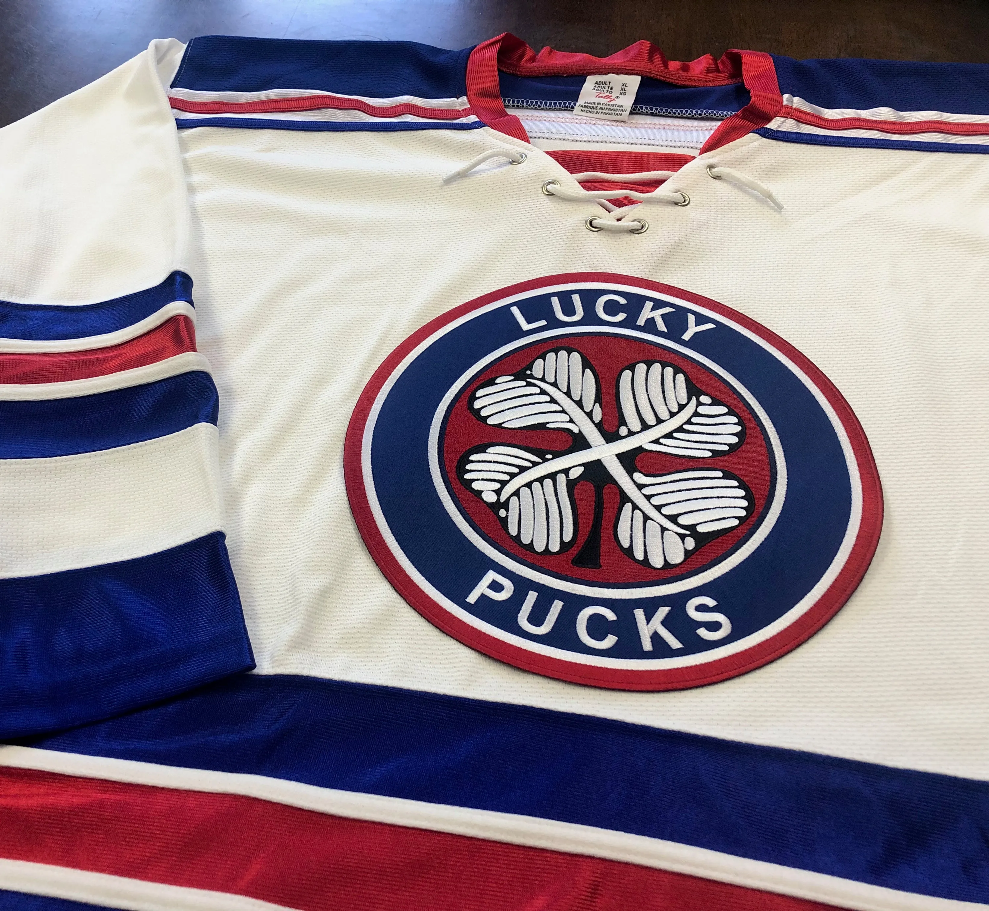 Custom Hockey Jerseys with a Lucky Pucks Twill Crest