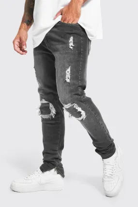 Skinny Stretch Rip And Repair Jeans With Zips